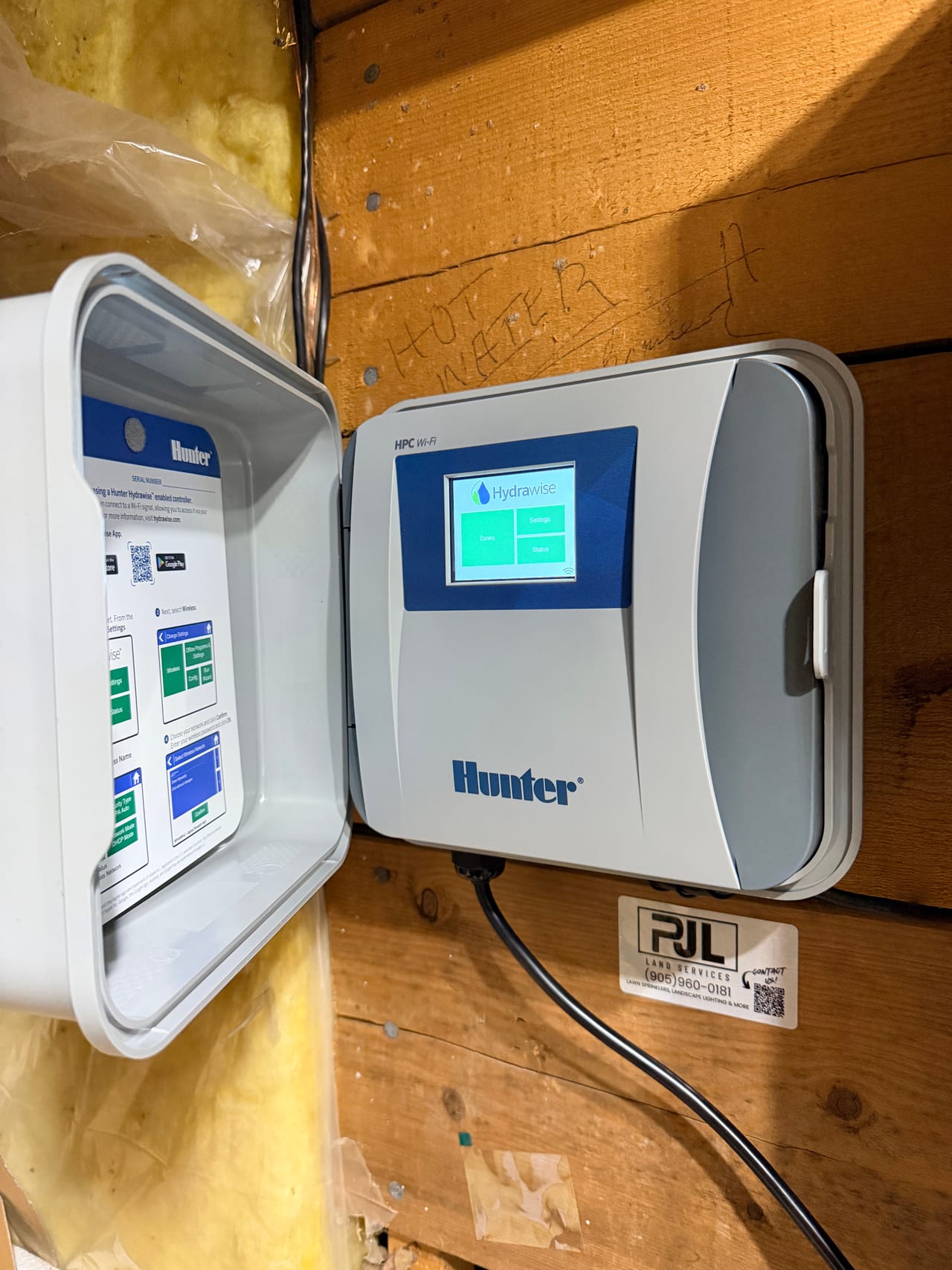 Hunter Pro-HC Hydrawise controller mounted in a garage in Newmarket Ontario