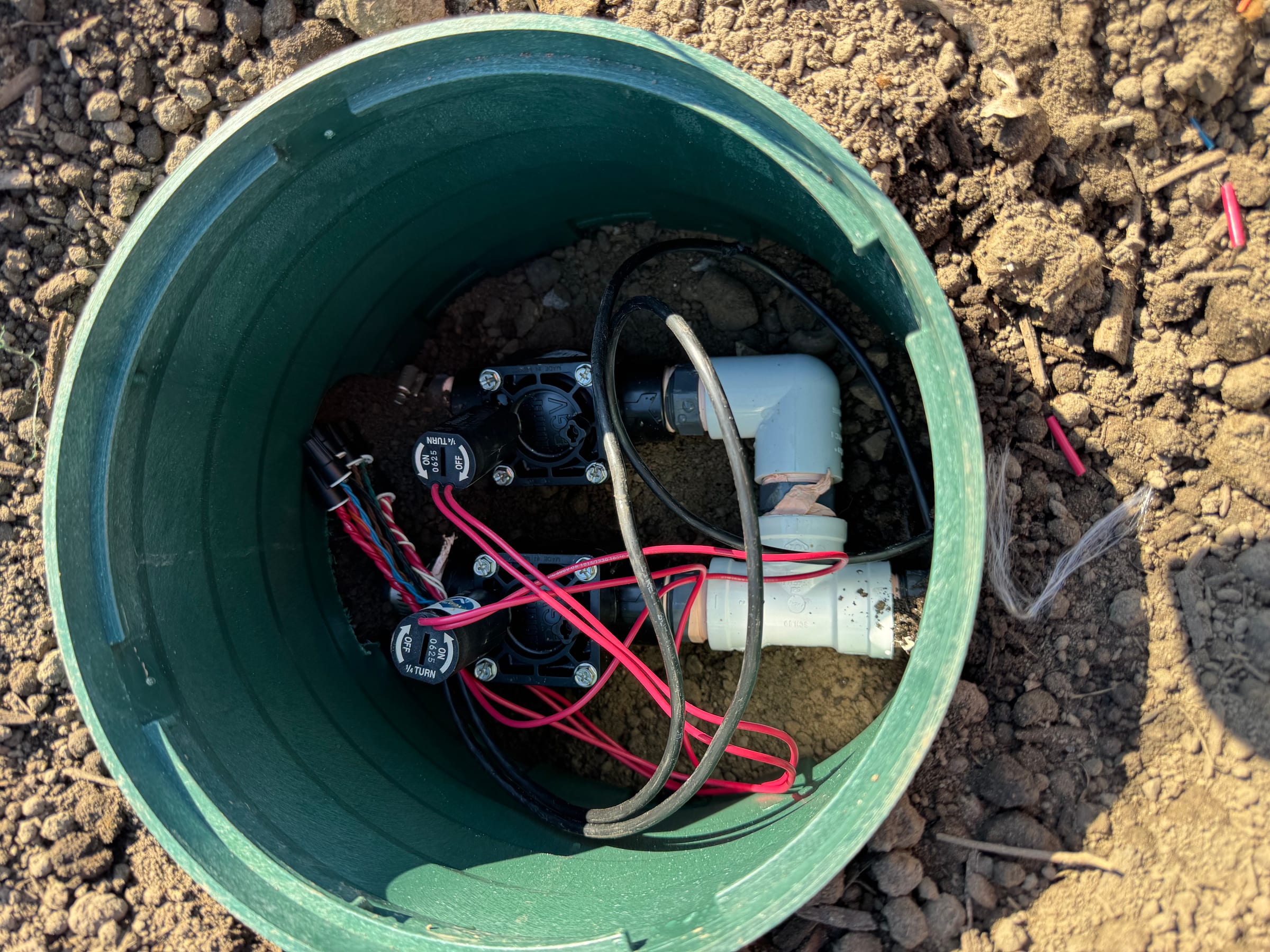 Sprinkler repair in progress during an in-season visit in North York